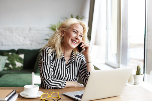 middle-age-woman-phone-laptop